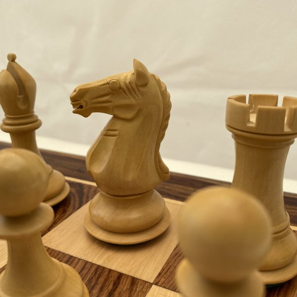 Powerful figures. Chess game concept of black wooden king and
